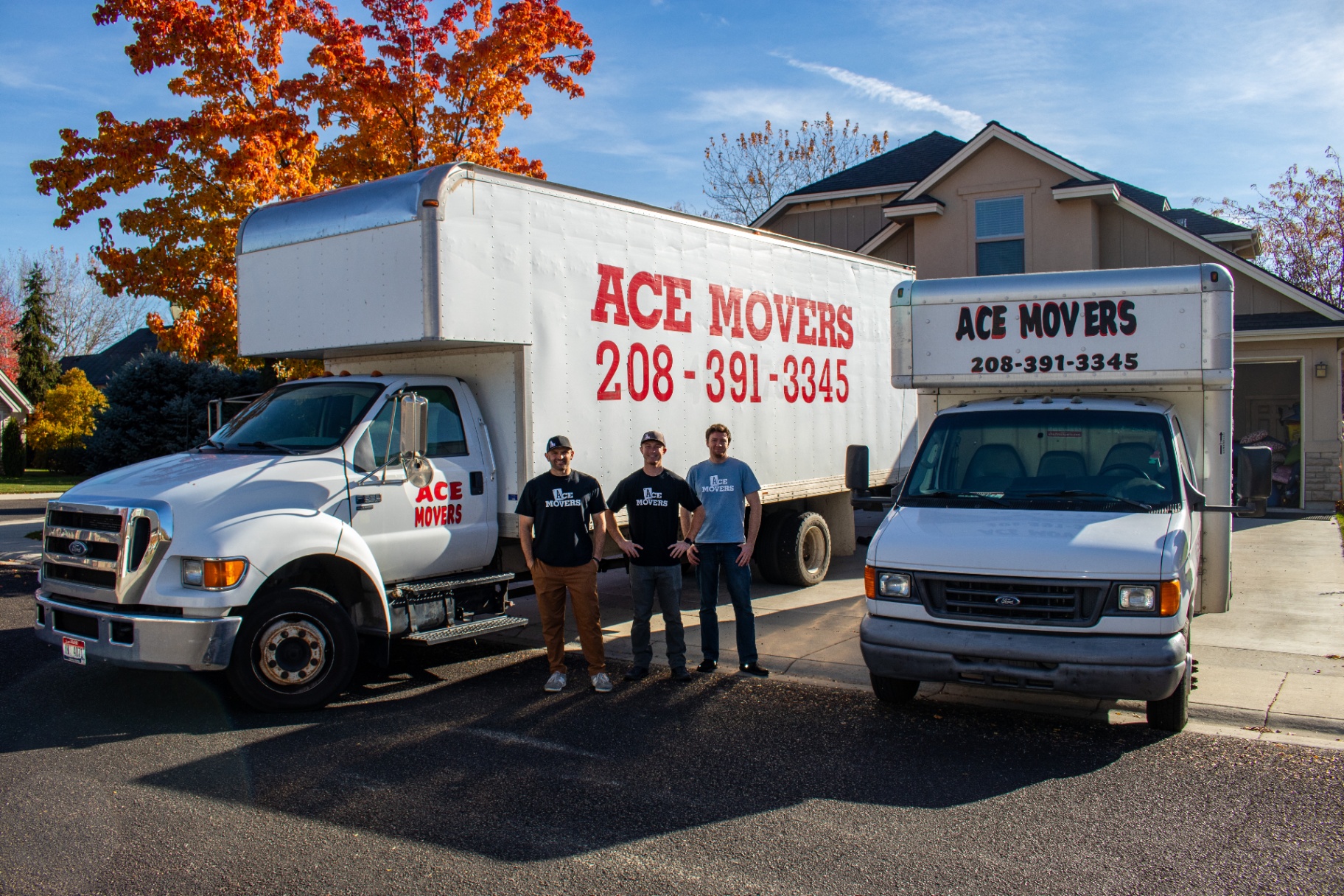 The Ace Movers crew with their trucks